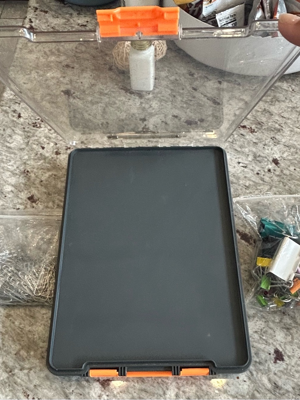 Gray Protective Clipboard Case, includes a bag of paper clips and gem clips.